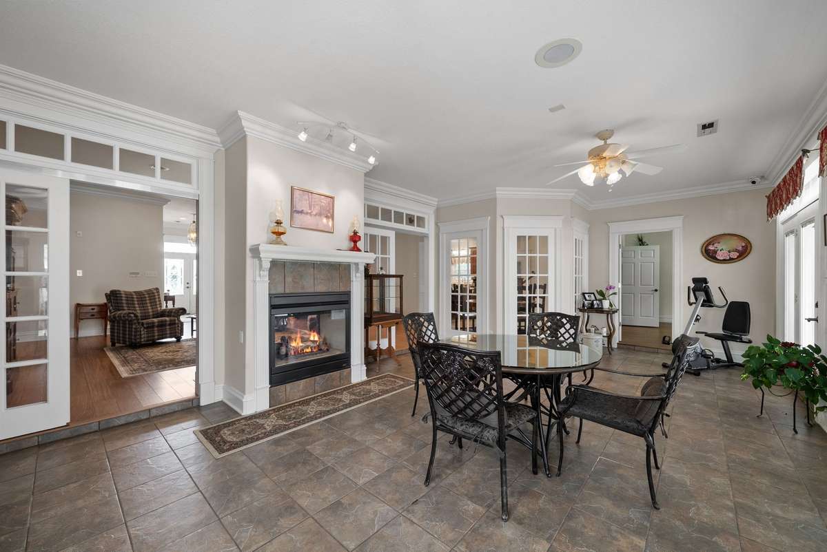 Sunroom showing the double-sided fireplace