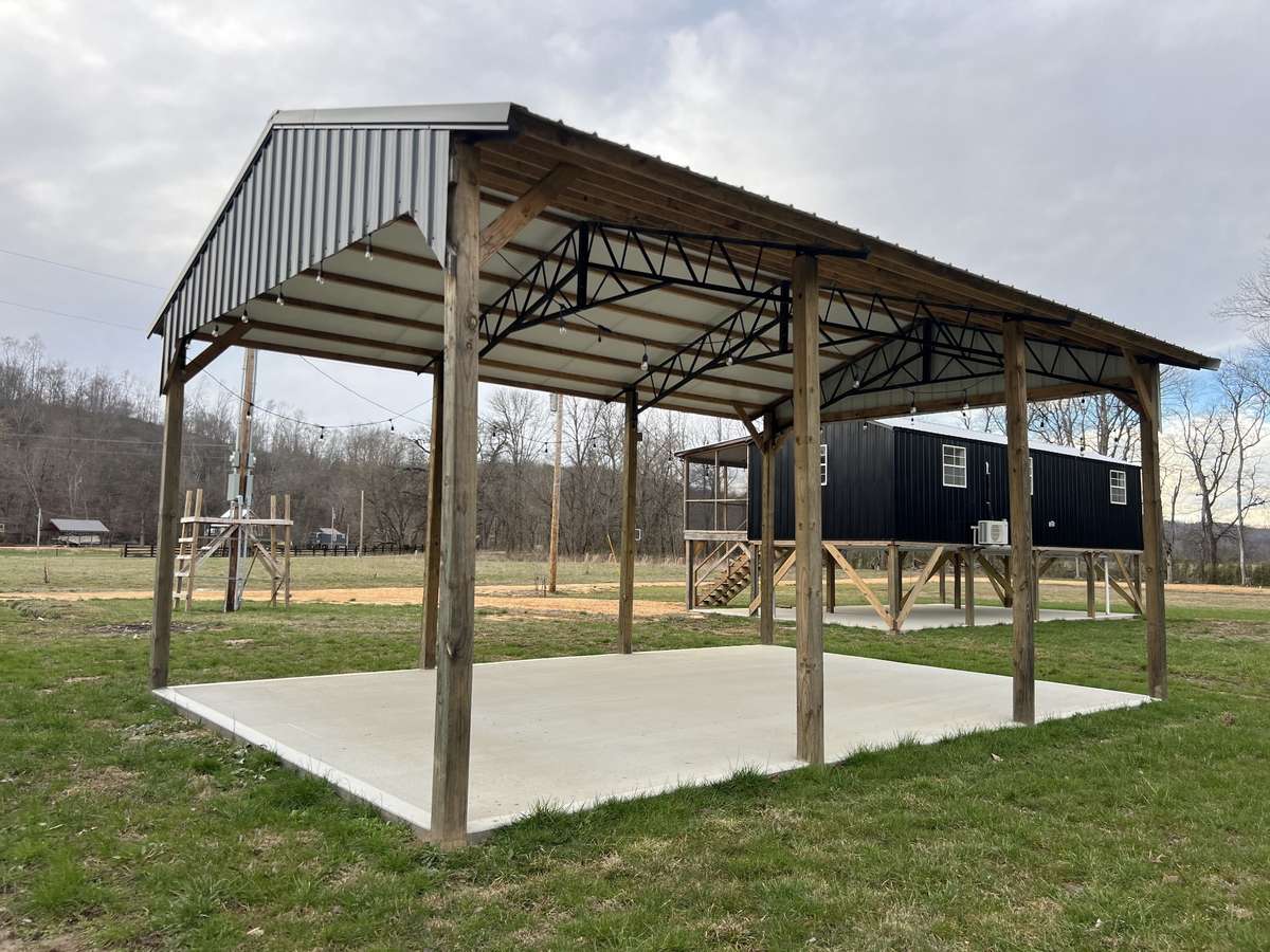Large pavilion with concrete floor and electric