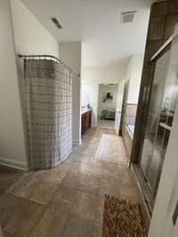 Primary bath. Added privacy curtain around urinal.