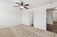 Second floor bedroom #5 showing access off the upstairs hall and shared bath on the left.