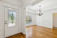 Formal Dining room w/trey ceiling and 3/4" sand and finish oak hardwood.