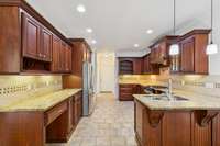 Extra kitchen cabinetry to the left.  Includes household "office" space.