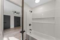 Primary Bedroom with 3 Closets. Don't miss the closet behind the door as you enter the bedroom... Tub/Shower Combo, New Toilet, Vanity & Lights PLUS a Built in Medicine Cabinet. Check out the faucet, super cool!