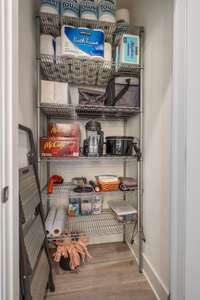 Storage with sturdy metal shelving, offering efficient storage for bulk items, kitchen appliances, and daily essentials.
