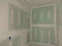 Both bathrooms done in greenboard