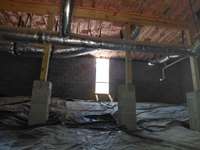 Under home. opening to storm shelter.