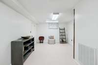 Basement finished area is used as a den/gameroom.