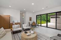 The hallway leads to the pool bath with shower, storage and pool laundry.