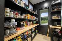 This pantry is everyone cooks dream. Large "L" Pantry.