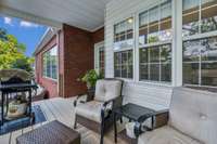 This view shows the covered deck just off the breakfast nook and kitchen