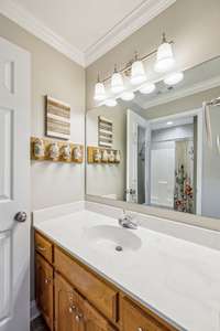 Your own vanity and crown molding already in place in this Jack-n-Jill bath