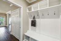 The second entrance is on the Utility Room side. Walk in to a great built in cubby. Great for shoes, backpacks and all those extras.