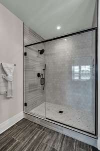 Large, Custom Tiled  Primary Shower with Beautiful Finishes.