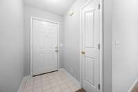 Front entry with a storage closet.