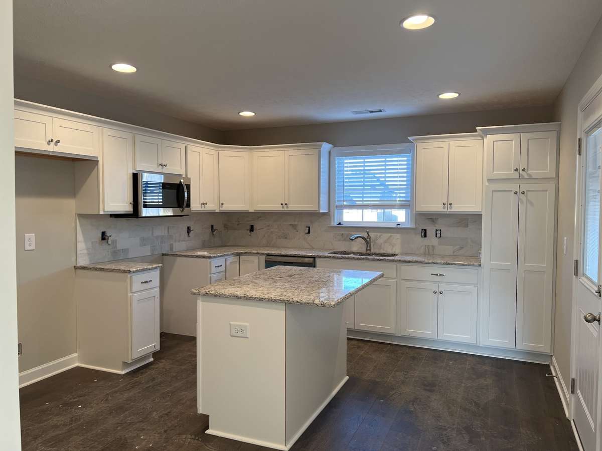 Photo of different home but same floor plan. Finishes will vary.