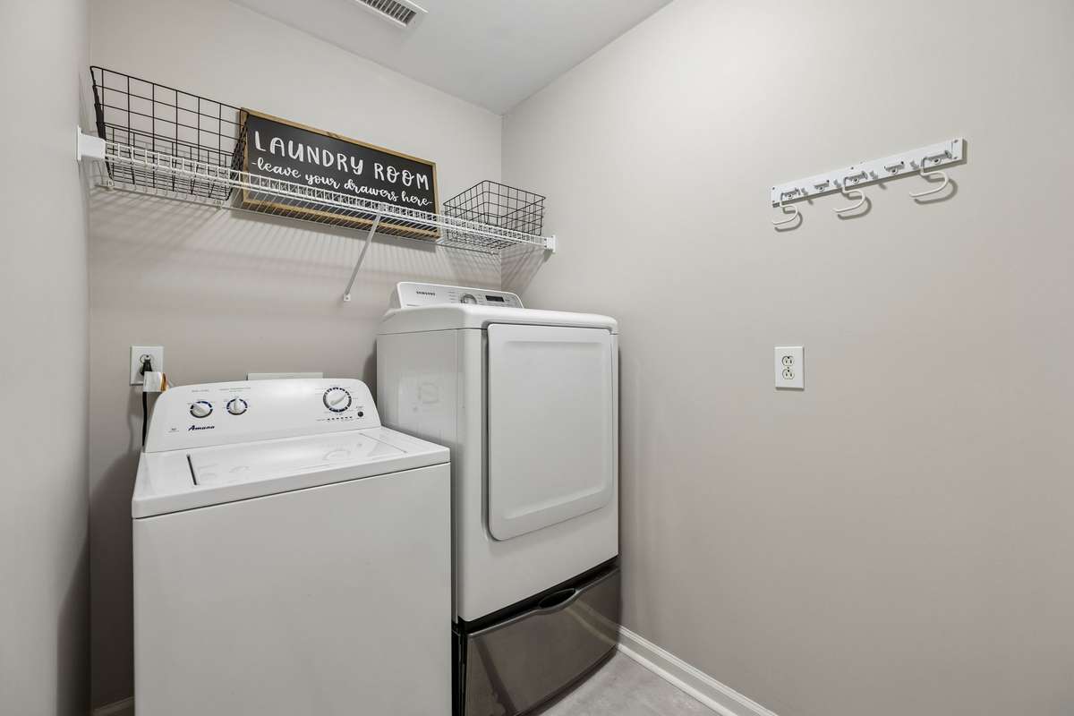 Laundry Room with walk in pantry. All appliances remain including the washer & dryer!