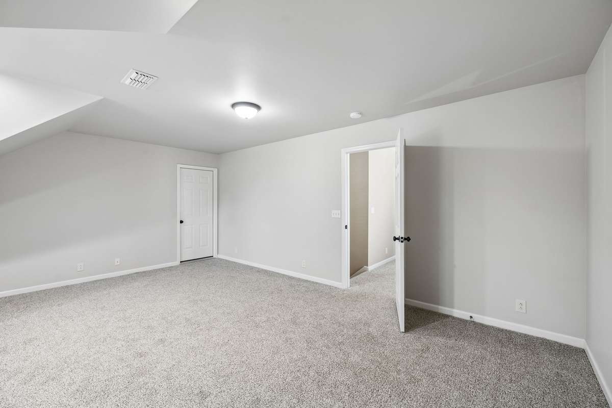 Bonus Room with doorway to walk out storage