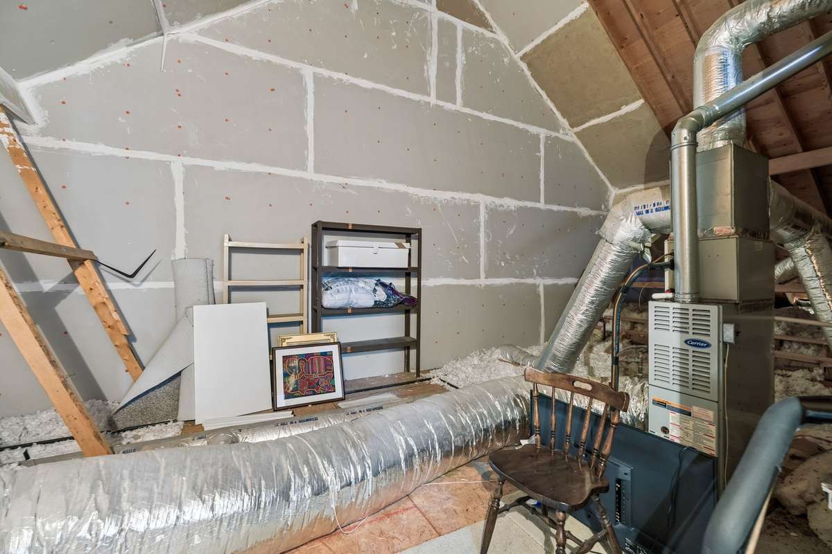 Huge walk-out unfinished area off bonus room for storage or expansion.
