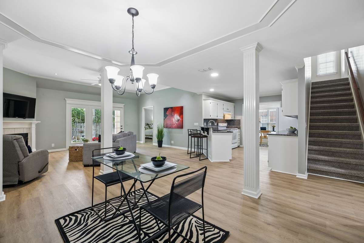 The open living and dining areas create a welcoming space for everyday living and entertaining, flowing seamlessly into a well-appointed kitchen with plenty of storage, workspace and breakfast room/office.