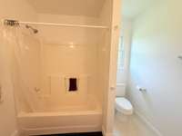 Combo shower tub in upstairs bathroom