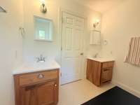 Upstairs bathroom with two vanities