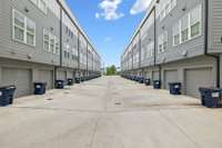 Visitor parking is located at the end of the alley, on the left and right.