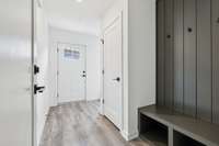 Looking from Garage.  Hang up your coat and take off your shoes!