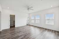 The primary bedroom features TWO walk-in closets!