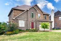 Welcome to 312 Dogwood Trail , handsome 2-story brick on a quiet, private cul-de-sac.