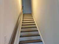 Wood stained oak treads and painted risers