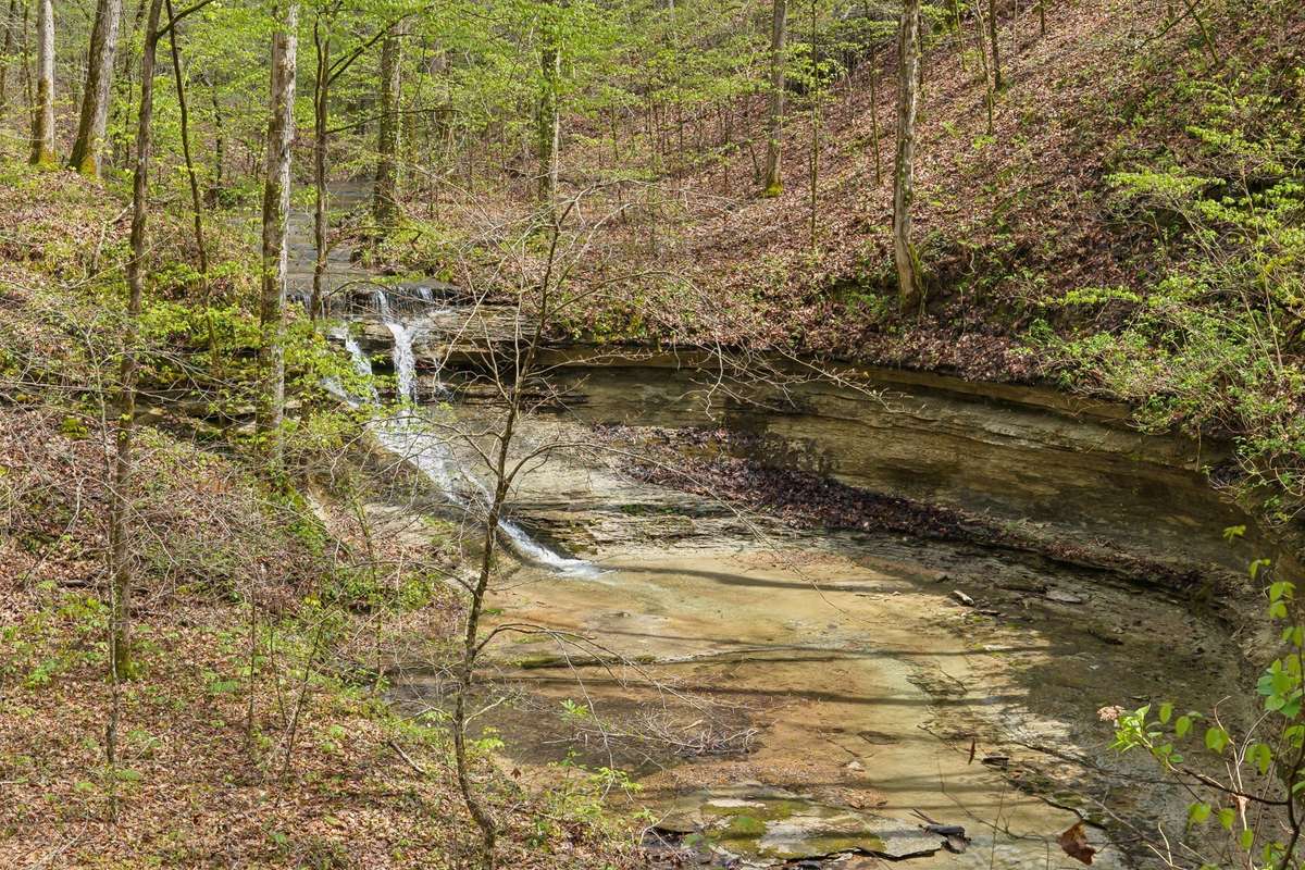 Waterfall view from off grid cabin