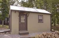 Casita has been turned into a sleeping quarters with a king bedroom with bunk beds.