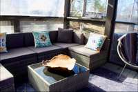 Screened room right by the front door.