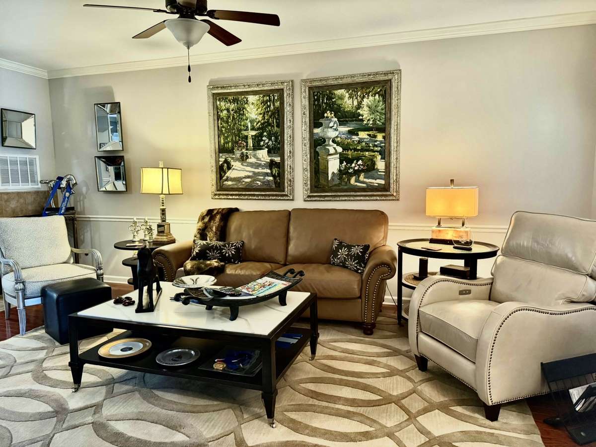 Wow beautiful and comfortable leather Sofa and electric leather Recliner and aQuartz Coffee Table.