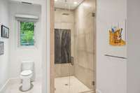 Bath 1 of 2. Superb tile and stone throughout. This shower design looks like beautiful artwork.