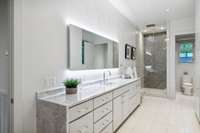 Bath 2 of 2. Stunning water-falled stone.