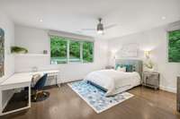 Beautiful views to the back yard pool and side green.