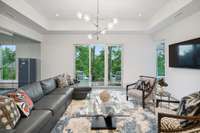 Beautiful doors out to the deck. More stunning green views.