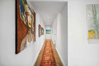 Long upstairs hallway to 2 bedroom suites and the Bonus Room.