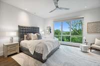 Spacious, serene, main floor primary suite with flawless views.