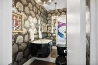 Powder room 1 of 2 on the main level.