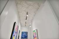 No detail was spared in this home. Geode ceiling in one of the lower level hallways.