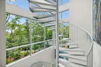Massive aluminum staircase to all floors.