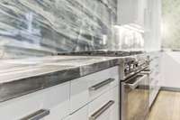 2" thick full surround counters, backsplash and island.