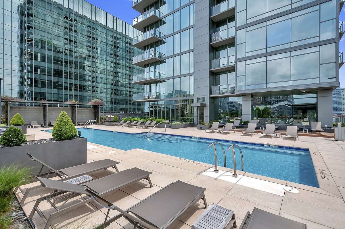 Spectacular pool deck with plenty of space to enjoy the sun and the serene space!