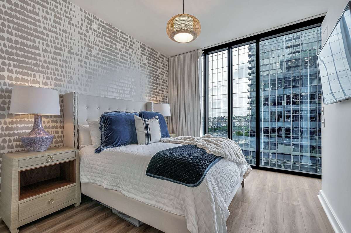 Unit 914 comes with custom motorized blackout curtains guaranteeing great sleep!