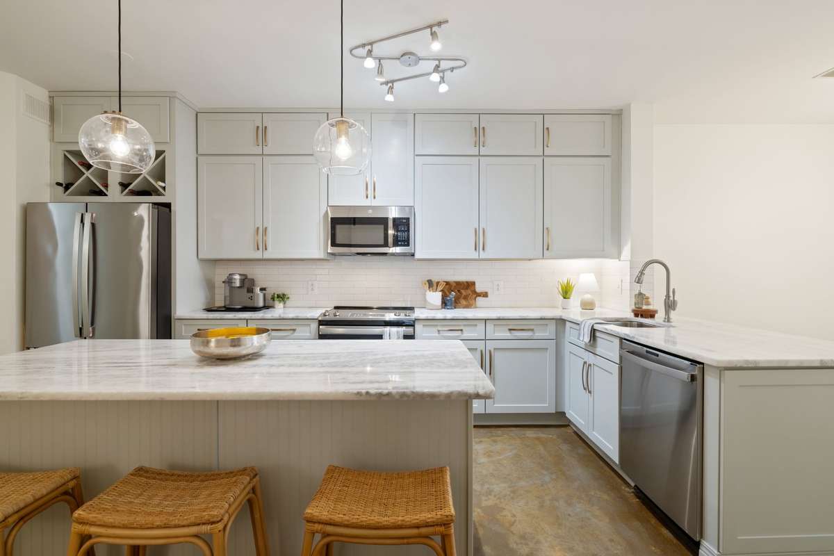 Gorgeous custom kitchen remodel with ceiling height slow-close cabinets and drawers, chef inspired oversized drawers, designer hardware, backsplash and GE upgraded appliances.