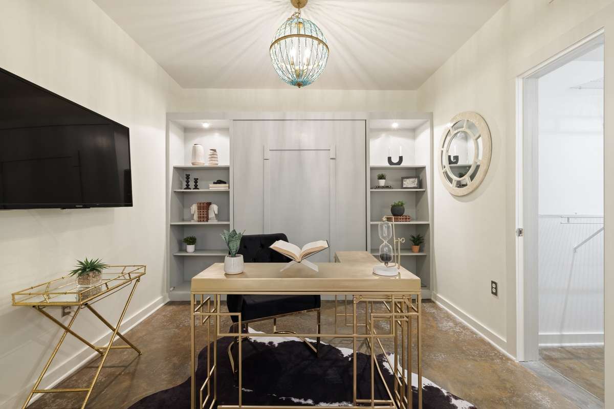 2nd bedroom or Office with another large walk-in closet. Easy pull-down murphy bed & smart TV included.