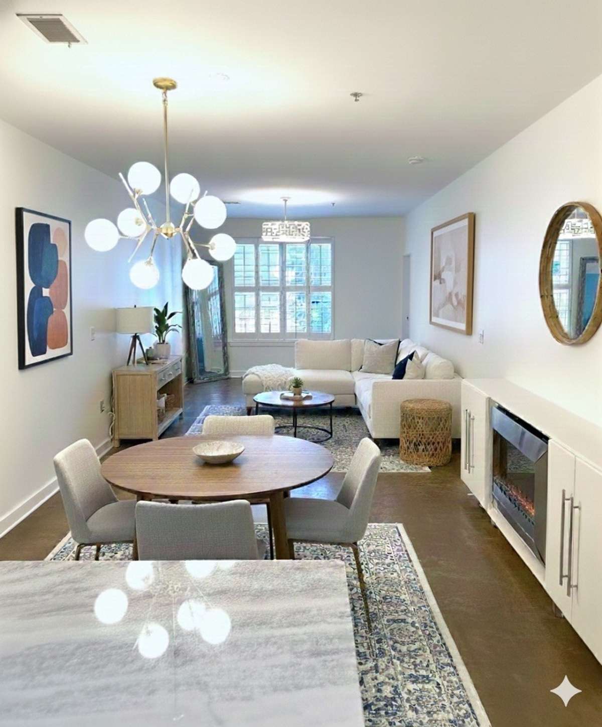 Pick your passion....couch to the left or couch to the right! This space is so long and versatile. This shows a different layout.