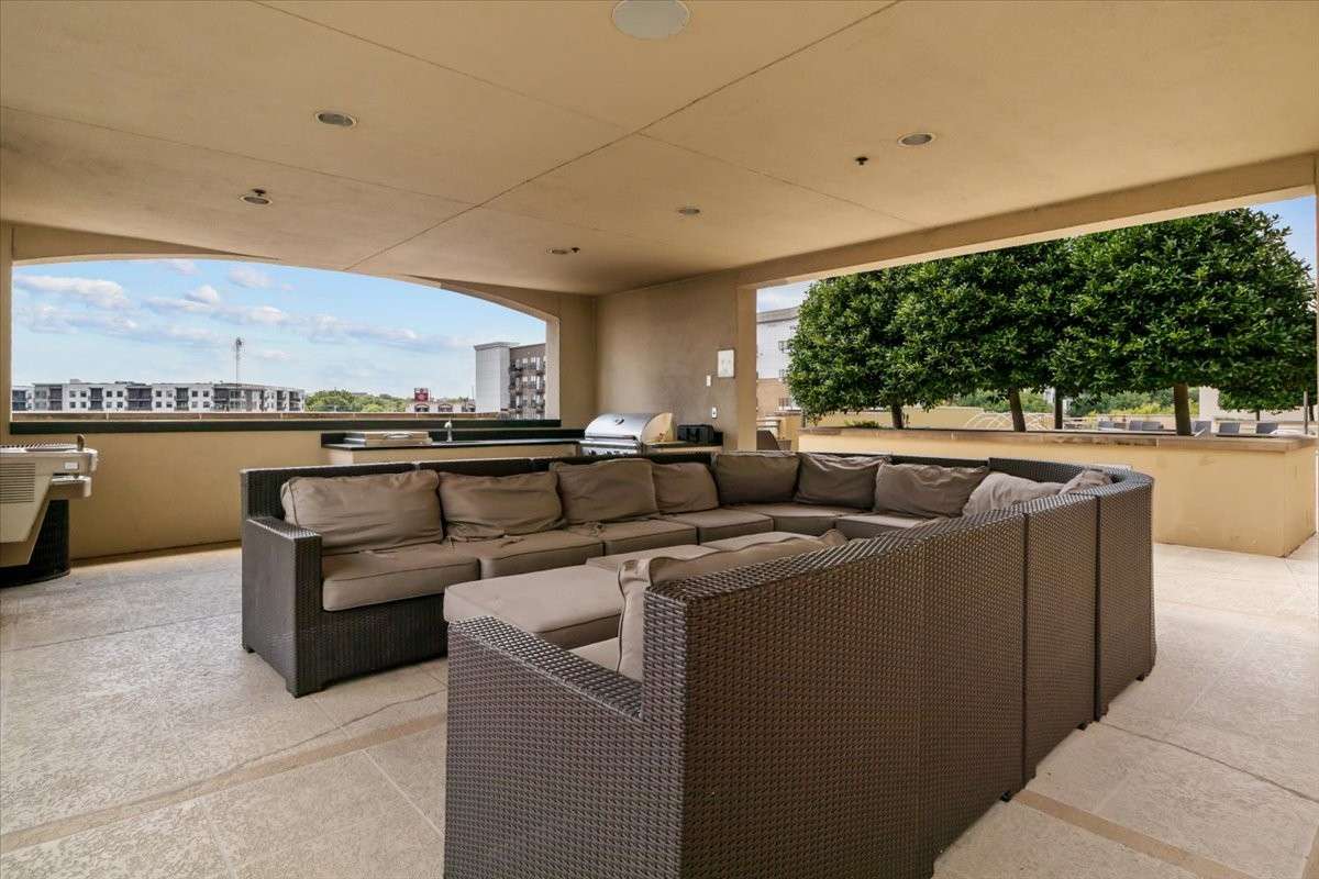 Step outside the unit to a common entertainment area.